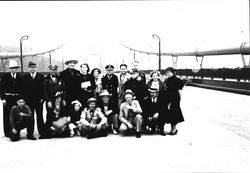 Group of people on the Golden Gate Bridge prior to its opening, May 26, 1937