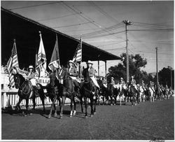 California Centaurs mounted junior drill team in the Sonoma County Fairgrounds arena, Santa Rosa, California, 1946