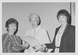 Helen Putnam presenting a Board of Supervisors resolution to two members of Zonta, Santa Rosa, California, 1984
