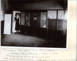 Martha Teach Rayner standing in the Penngrove Post Office, California in Penngrove, California, 1919