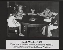 Children reading at Petaluma Carnegie Library, 20 Fourth Street, Petaluma, California, 1939