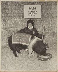 Deanna Groves and her FFA grand champion hog at the Sonoma County Fair, Santa Rosa, California, 1984