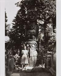 Mary McGregor standing in front of a totem pole, Emerald Bay, California, 1941