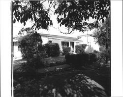 Unidentified single-story house with adjoining tankhouse in Petaluma, California, 1960s or 1970s