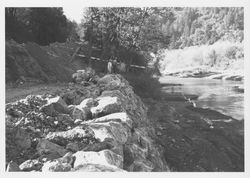 Inspecting the retaining wall along the Russian River