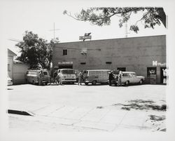 Bruner's trucks parked behind the Bruner Building, Santa Rosa, California, 1964