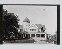 Unidentified three-story Queen Anne Victorian home with a central four-story tower, 1960s or 1970s