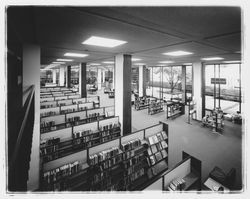 Looking at the fiction, art, and music sections of the Library, Santa Rosa, California, 1967