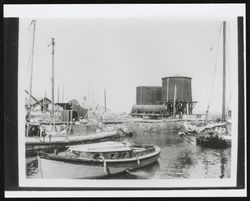 Scows docked behind Vonsen warehouse