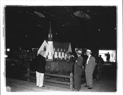 Men looking at a model of a church, Petaluma, California, about 1949