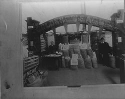 Golden Eagle feed display at an unidentified trade show, Sonoma County, California(?), about 1915