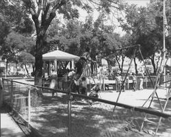 Speakers in the bandstand at an unidentified ceremony in Walnut Park, Petaluma, California, about 1952