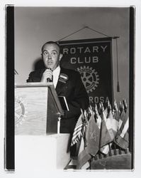 Denny Daw speaking at a Rotary Club meeting