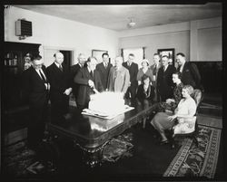 Ernest Finley cutting the cake