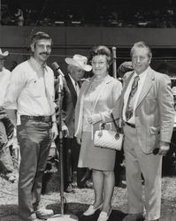 Earl Holtz standing with Clorinda and Ray Gambonini at the Sonoma County Fair, Santa Rosa, California, 1973