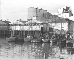 Boats tied up behind Golden Eagle Milling Co