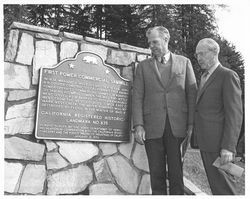 Norman Livermore and C. Raymond Clar with plaque dedicating California historical landmark no. 835 near Mirabel Park, California, site of Cooper's Sawmill, the first commercial power sawmill, about 1970