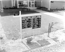 Sign listing doctors at Santa Rosa Medical Clinic, Santa Rosa, California, 1957