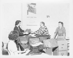 Packing up office equipment at City Hall, Petaluma, California, 1954