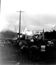 Fire consuming a structure