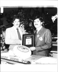 Don Viviani with a wheel of Sonoma Jack Cheese, Sonoma, California, 1981