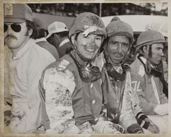 Groom and jockeys rest after the race at the Sonoma County Fair Racetrack, Santa Rosa, California