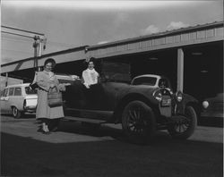 Petalumans posing in and around their vintage cars, Petaluma, California, between 1952 and 1956