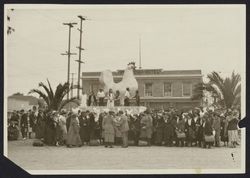 Crowd waiting at the train station, Petaluma, California, about 1925