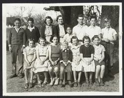 Mrs. Phrona E. Bates with her students at Lone Redwood School