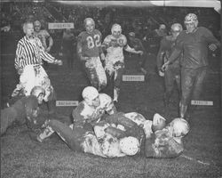 Egg Bowl turns into mud bowl, Petaluma, California, Dec. 3, 1951