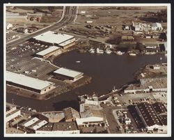 Aerial view, looking east, of the Golden Eagle Shopping Center, Washington Street and Petaluma River turning basin