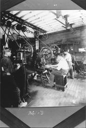 Working on machines at Petaluma Incubator Company, 242 Petaluma Boulevard North, Petaluma, California, 1912