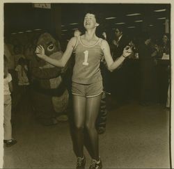 Eeyore and Tigger at Sears opening day celebration dancing with a girl in shorts, Santa Rosa, California, 1980