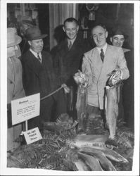 C. Ralph Farmer holding fish, Santa Rosa, California, about 1945