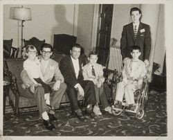 Sport figures with crippled children who participated in the charitable events of the Red Coat Organization, Santa Rosa, California, 1960