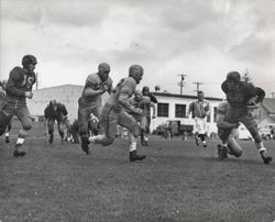 Defensive play during Petaluma Leghorn game against an unidentified team