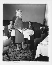 Worsted wool mid-length skirt and jacket modeled in the "Dramatic Moods" fashion show in the Topaz Room, Santa Rosa, California, 1959