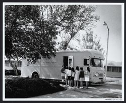 Queue outside the Bookmobile II