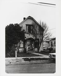 Simple Greek Revival type form with jerkin head roof and decorated gable end