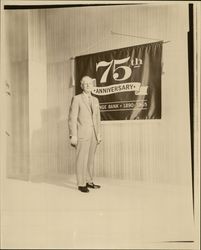 C. W. Reinking in front of an Exchange Bank banner, Santa Rosa, California, 1965