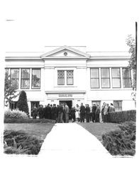 Group of people entering Petaluma City Schools Administration Building, Petaluma, California, 1955