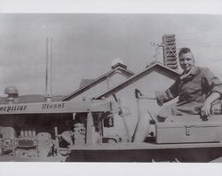 Gloria Kullberg operating a bulldozer, 5100 Lakeville Highway, Petaluma, California, in the 1940s