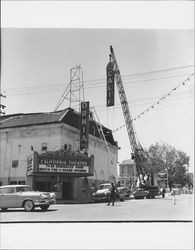 California Theatre sign being removed, Petaluma, California, 1958