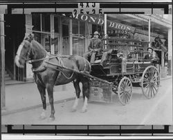 Petaluma Fire Department hose wagon outside Raymond Brothers on Main Street, Petaluma, California, 1909