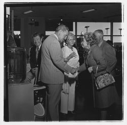 David Zumwalt and attendees at the the Zumwalt Chrysler-Plymouth Center Open House, Santa Rosa, California, 1971