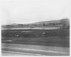 Flooded construction area between Petaluma Boulevard North and Highway 101 in southern Sonoma County, 1950s or 1960s