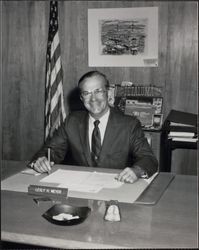 Portrait of Lesly H. Meyer at his desk, Petaluma, California, about 1966