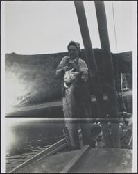 Anita Finley Dei with prize fish, Russian River, California