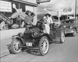 Petalumans posing in and around their vintage cars, Petaluma, California, between 1952 and 1956