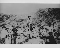 Group of people with giant octopus caught offshore near Jenner, California, 1939